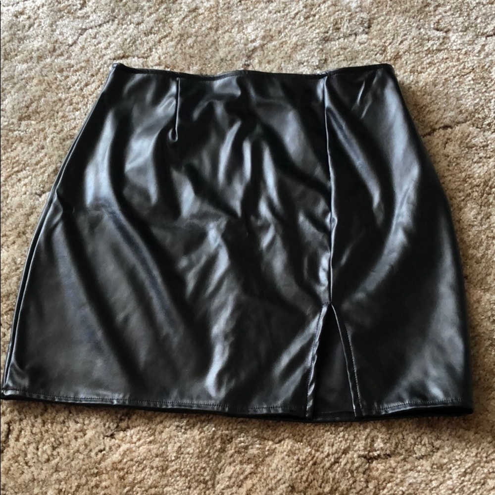 Black leather mini skirt